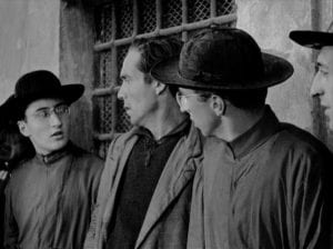 A young Sergio Leone (left) appears in Vittorio De Sica's Bicycle Thieves (1948), along with Lamberto Maggiorani (centre).
